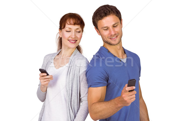 Pár mindkettő készít telefon mobiltelefonok férfi Stock fotó © wavebreak_media
