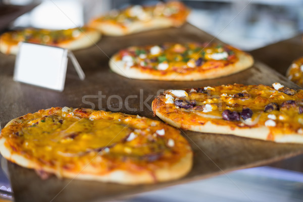 Cheesy pizza breads on tray Stock photo © wavebreak_media