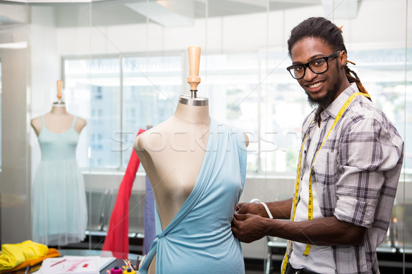 Male fashion designer and mannequin Stock photo © wavebreak_media