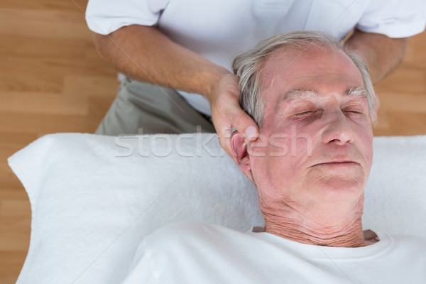 Om gât masaj medical birou cap Imagine de stoc © wavebreak_media