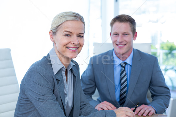 Business partners looking at camera Stock photo © wavebreak_media