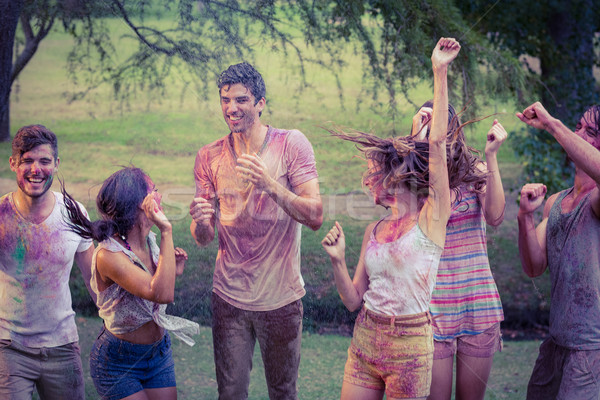 Stock photo: Happy friends covered in powder paint