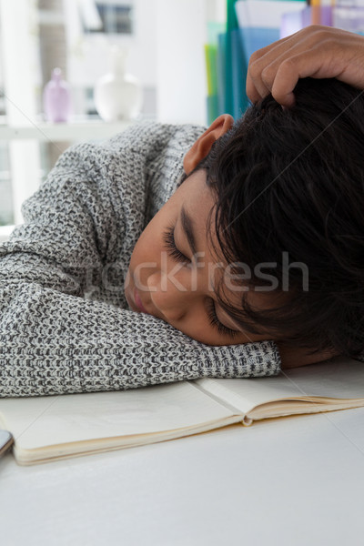 Közelkép fiú alszik könyv asztal iroda Stock fotó © wavebreak_media