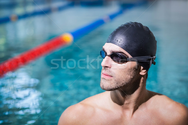 Upset man wearing swimming goggles Stock photo © wavebreak_media