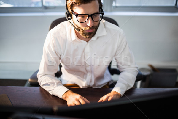 бизнесмен очки рабочих компьютер служба технологий Сток-фото © wavebreak_media
