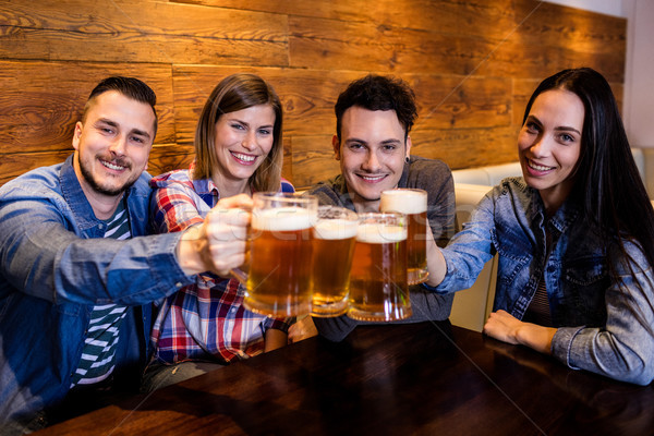 Portret vrienden bier restaurant gelukkig Stockfoto © wavebreak_media