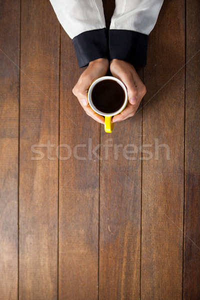 Mujer taza café mesa de madera negocios Foto stock © wavebreak_media