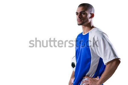 Portrait of football player holding a football Stock photo © wavebreak_media
