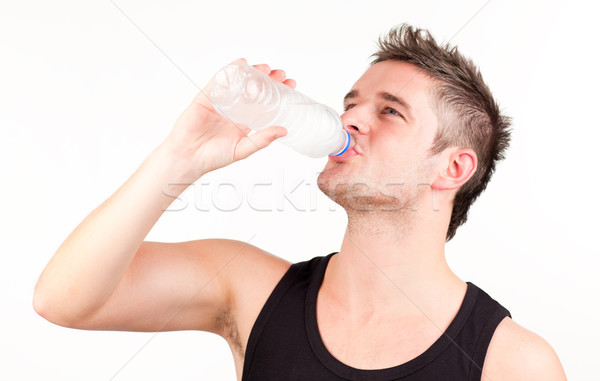 Uomo acqua potabile bere lavoro fuori palestra Foto d'archivio © wavebreak_media