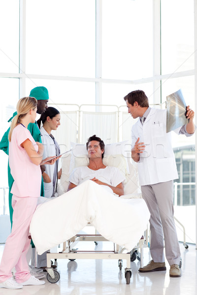 Stock photo: Doctors speaking to a patient