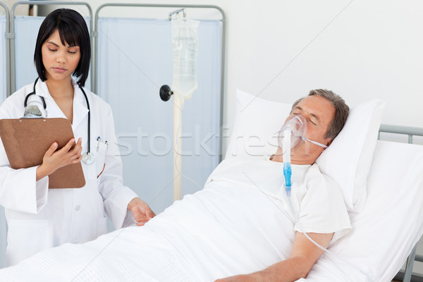 Stock photo: Nurse whith her mature patient in a hospital