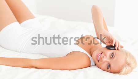 Young woman posing on her bed Stock photo © wavebreak_media