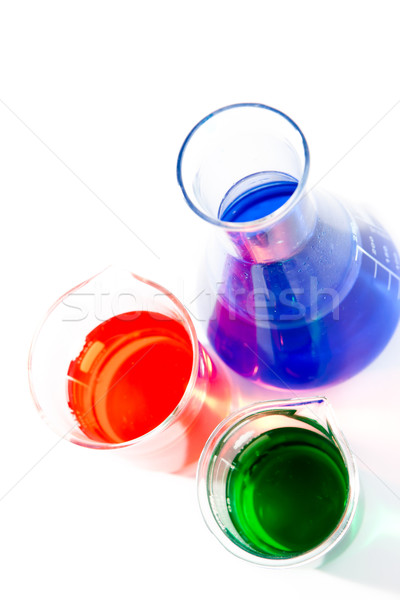 Two beakers and an erlenmeyer against a white background Stock photo © wavebreak_media