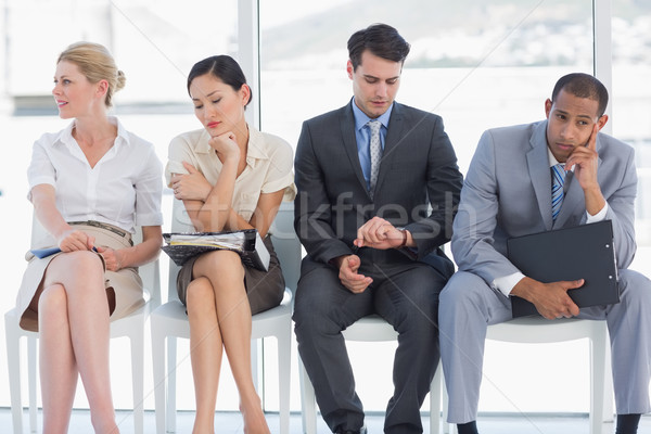 Cuatro gente de negocios espera brillante oficina Foto stock © wavebreak_media