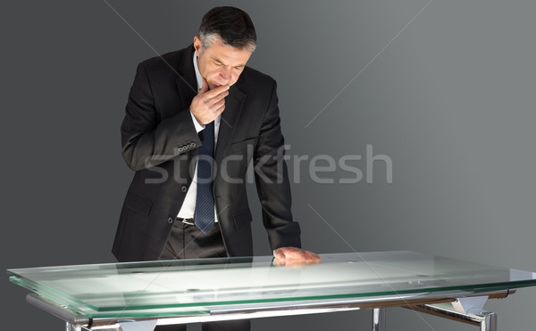 üzletember dől asztal fekete üzlet asztal Stock fotó © wavebreak_media