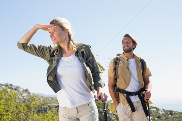 Attractive hiking couple walking on mountain trail Stock photo © wavebreak_media