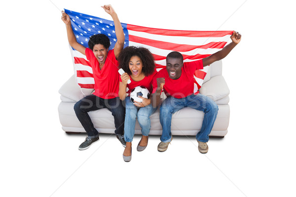 Football fans rouge canapé blanche [[stock_photo]] © wavebreak_media