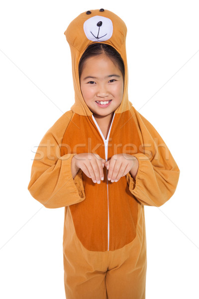 Happy little girl in bear costume Stock photo © wavebreak_media
