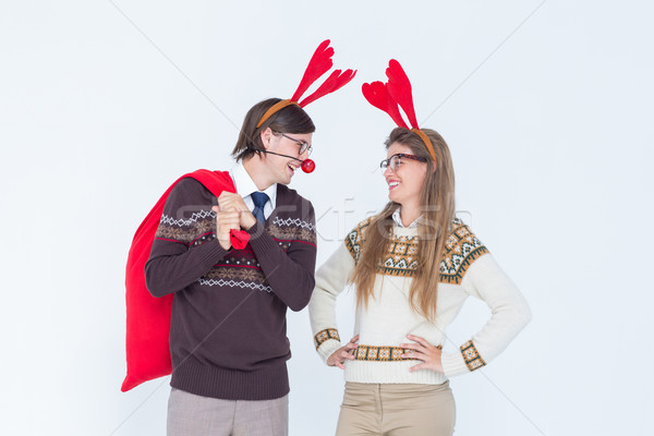 Happy geeky hipster couple with stag headband Stock photo © wavebreak_media