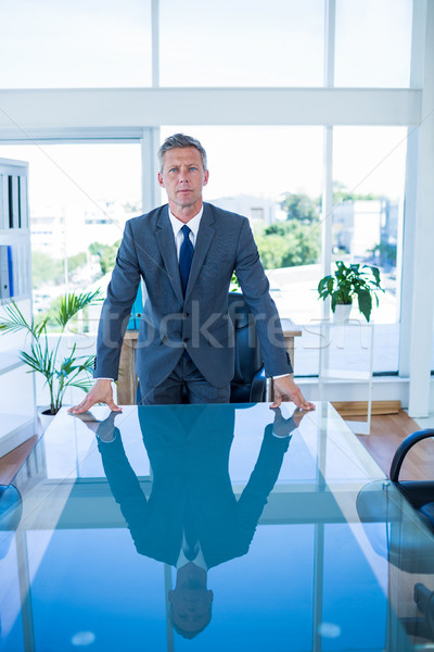 Serious businessman looking at camera  Stock photo © wavebreak_media