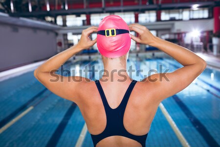 Geschikt vrouw zwempak handen heupen zwembad Stockfoto © wavebreak_media