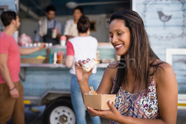 Stockfoto: Vrouw · eten · vergadering · bank · business