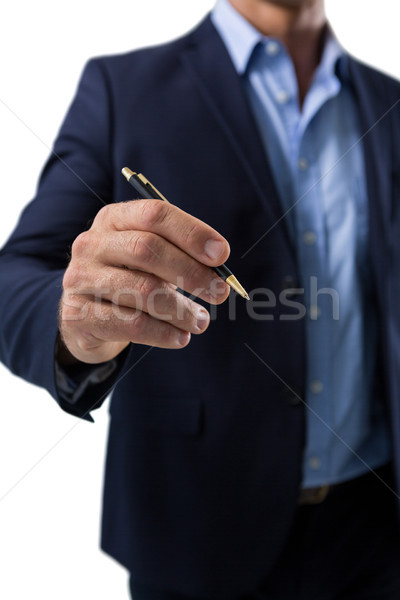 Businessman pretending to write on invisible screen Stock photo © wavebreak_media