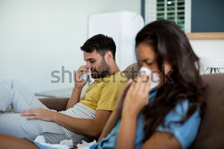 Stock photo: Worried father in living room looking at the camera