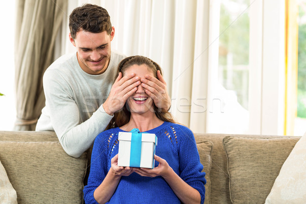 Man giving a surprise gift to woman Stock photo © wavebreak_media