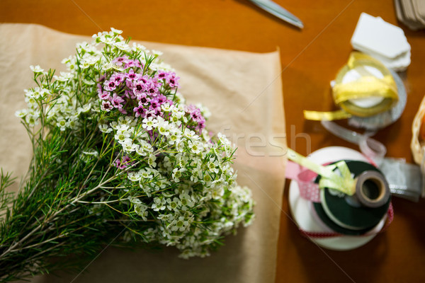 Flowers on the wooden worktop at flower shop Stock photo © wavebreak_media