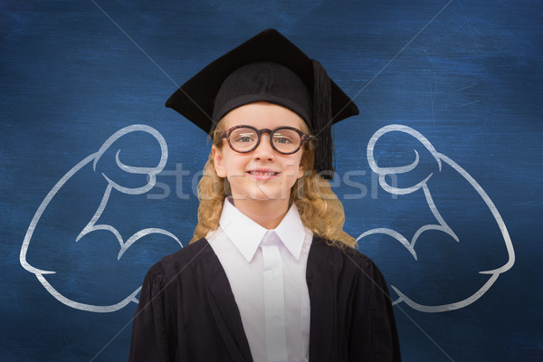 Composite image of cute pupil in graduation robe   Stock photo © wavebreak_media