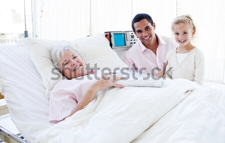 Imádnivaló kislány apa nagymama kórház lány Stock fotó © wavebreak_media