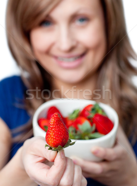 Cute mujer comer fresas blanco feliz Foto stock © wavebreak_media