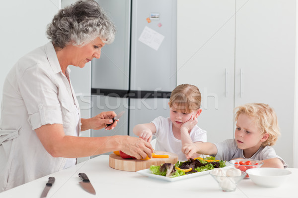 Stockfoto: Kinderen · koken · grootmoeder · home · familie · huis