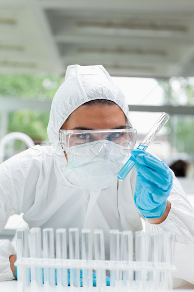 Portrait of a protected female scientist holding a test tube in a laboratory Stock photo © wavebreak_media