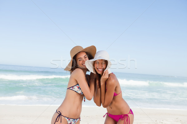 Souriant adolescent amis permanent plage [[stock_photo]] © wavebreak_media