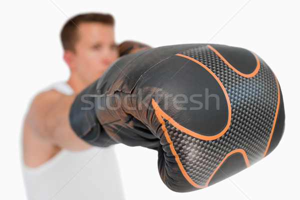 Stock photo: Close up of boxers fist against a white background