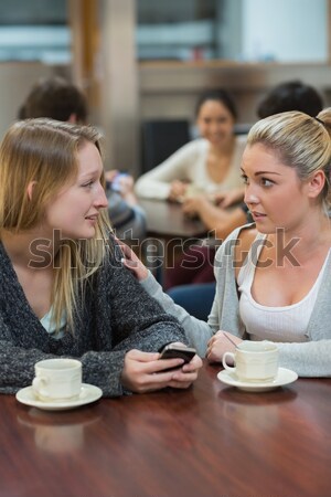 Kadın oturma kahvehane gülen gülümseme Stok fotoğraf © wavebreak_media