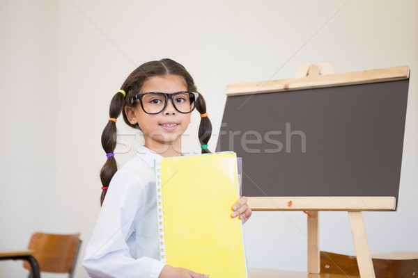 Cute pupil dressed up as scientist in classroom Stock photo © wavebreak_media