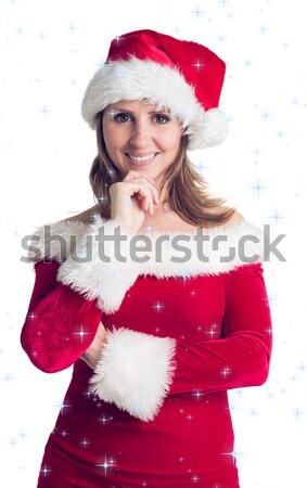 Pretty santa girl blowing over hands Stock photo © wavebreak_media