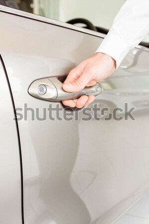 Stock photo: Close up of customer showing his new key