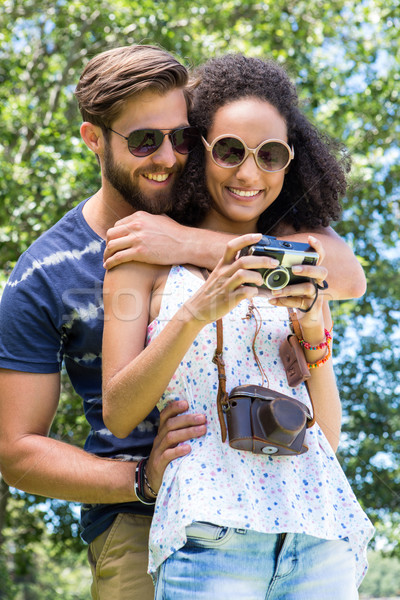 Couple regarder caméra homme heureux [[stock_photo]] © wavebreak_media