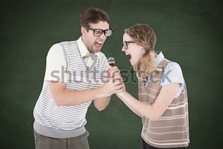 Woman whispering into male friends ear Stock photo © wavebreak_media