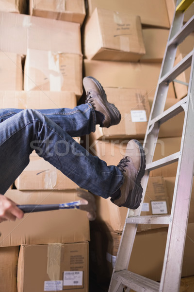 Worker falling off ladder in warehouse Stock photo © wavebreak_media