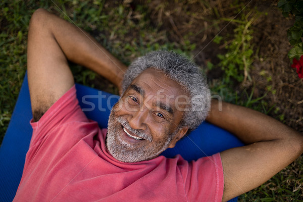 портрет улыбаясь старший мужчины осуществлять Сток-фото © wavebreak_media