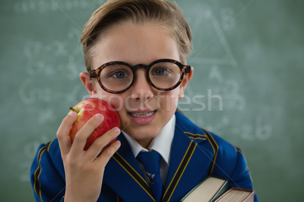 écolier pomme rouge tableau portrait livre [[stock_photo]] © wavebreak_media