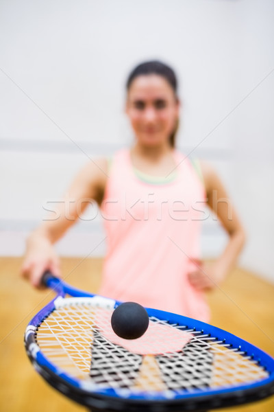 Woman balancing a ball on her racket Stock photo © wavebreak_media