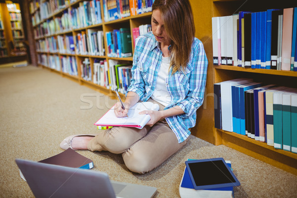 Mature student in the library Stock photo © wavebreak_media