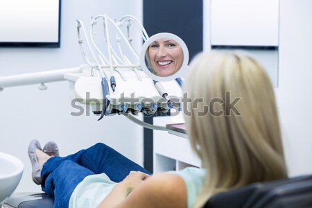 Girl standing in corridor and looking at iv drip Stock photo © wavebreak_media