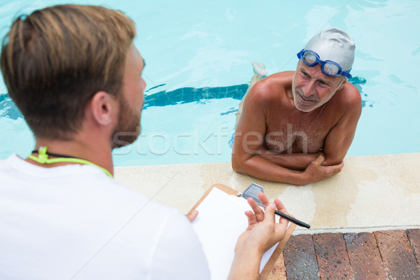 Schwimmen Trainer Senior Mann glücklich Stift Stock foto © wavebreak_media
